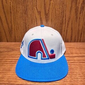 Mitchell & Ness Cream Quebec Nordiques/Colorado Avalanche Heritage Snapback Hat